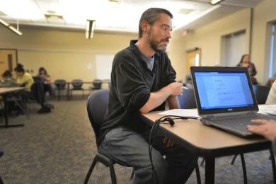 David Smith applied for healthcare during a March 2014 insurance assistance fair.