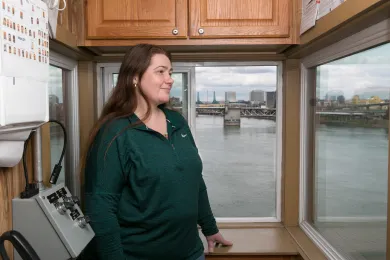 Tammy Vanderlinden surveys the Hawthorne Bridge and the Willamette River from her office in the operator's tower. 