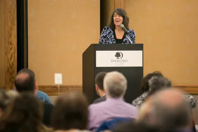 Commissioner Meieran addresses the crowd at the annual NAMIWalks Luncheon