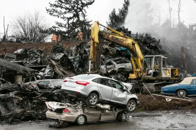 Firefighters put out a five-alarm blaze at a salvage yard near NE 75th Ave. and NE Killingsworth Street that sparked March 12, 2018