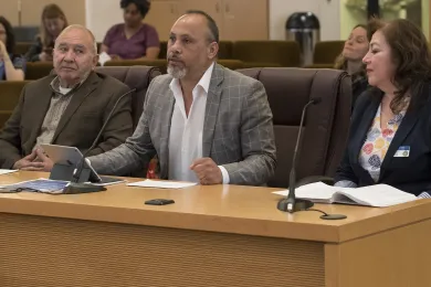 Members of the state's Commission on Hispanic Affairs, Alberto Moreno, center, along with Joseph Gallegos and Linda Castillo.