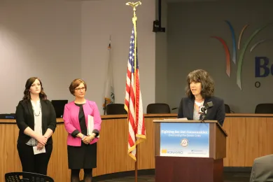 Commissioner Sharon Meieran (right) speaks at an April 23 press conference as Congresswoman Suzanne Bonamici (center) and community member Jessica Cardinal look on.