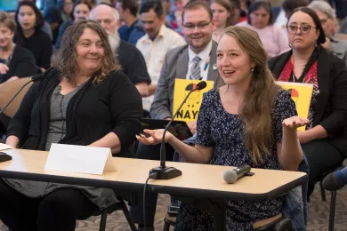 Jenya Rafi, right, testifies about the benefits of WICs breastfeeding peer support team.