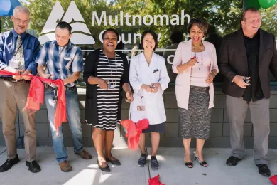 Clinicians, clients and county leadership cut the ribbon on the North Portland clinic remodel
