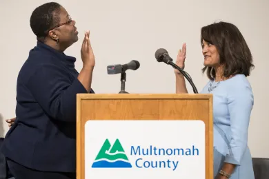 Oregon Supreme Court Justice Adrienne Nelson swore in commissioner Susheela Jayapal.