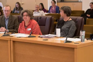 Laura Golina de Lovato, second from left, executive director of Northwest Pilot Project