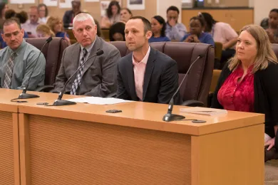From left:  Portland Police Bureau Captain Derek Rodrigues; PPB Sergeant Tim Musgrave; Brian Hughes of County Human Services; and Mary Joy of Lutheran Community Services brief the Board of County Commissioners on elder abuse