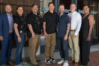 Members of Multnomah County's Mental Health Unit pose for photo after Pretrial, Probation and Parole Supervision Week proclamation.