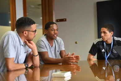 From left: Lakayana Drury, Sema’J Wade and Amarien Simmons talk about their third year in the Word is Bond program.