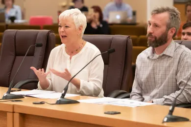 Environmental Health Director Jae Douglas, PH.D., left, testifies before the Board Sept. 26 on proposed food cart pod ordinance.