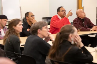 Trent Gay, a career coach with Central City Concern, speaks up at a peer stakeholder meeting in October 2019