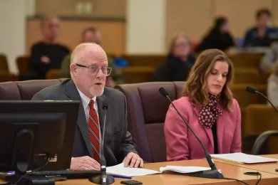 County Transportation Director Ian Cannon addresses board, with County attorney Courtney Lords.