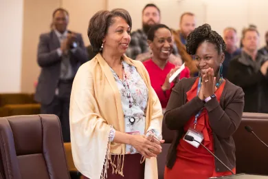 Integrated Clinical Services Director Vanetta Abdellatif, left, is cheered on her last day by interim director Tasha Wheatt-Delancy