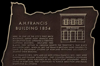 Historic plaque on Morrison Bridge honors one of Oregon's first African American businesses.