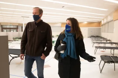 Marc Jolin and Chair Deborah Kafoury tour the about-to-open Arbor Lodge winter shelter Nov. 19, 2021.