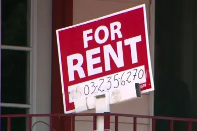 "FOR RENT" sign