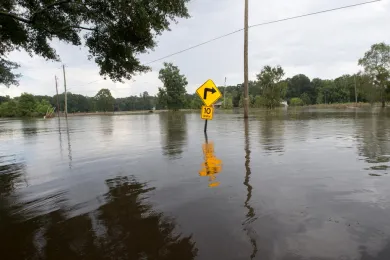 Picture of road sign with water all the way to the top