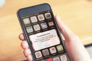 picture of phone with message "Presidential Alert: This IS A TEST of the National Emergency Alert System. No action is needed