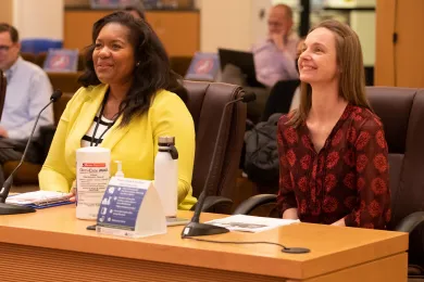 (Left to right): Early Learning Division Director Leslee Barnes and Brooke Chilton-Timmons, analyst, brief the Board of Commissioners