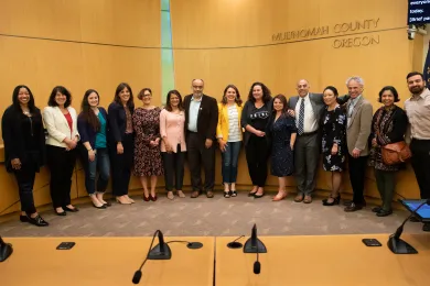Invited guests pose with the Board of Commissioners during the Arab American Heritage Month proclamation.