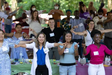Community health workers dancing at the Mt. Tabor Park appreciation event 