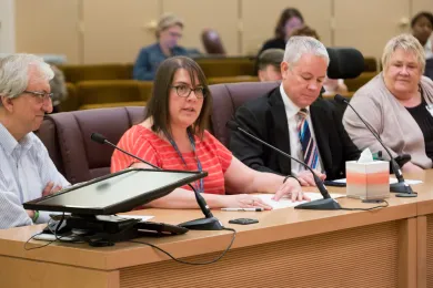 Erin Grahek, (second from left) speaks at 2017 board meeting. 