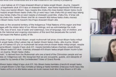 screen shot of the presentation where Raven Harmon is reading the proclamation