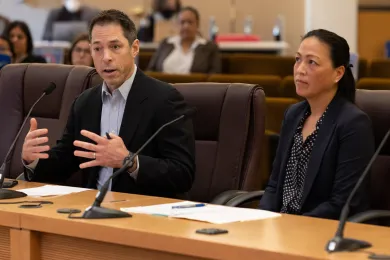 Joy Heinecke, right, from County Facilities, and Jed Tomkins present on the lease for a new motel shelter Nov. 10, 2022.