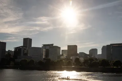 Blazing sun over a hazy downtown Portland skyline