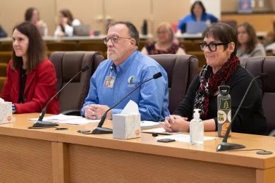 Photo of Animal Services leaders at board meeting