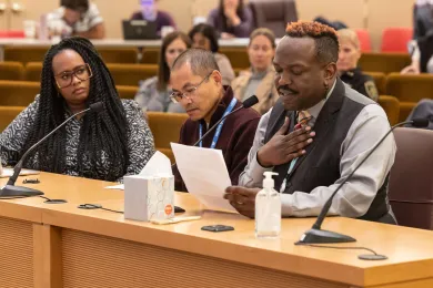 (Left to right): Canada Taylor Parker, Scott Vu, and James Dixon present to the Board of County Commissioners