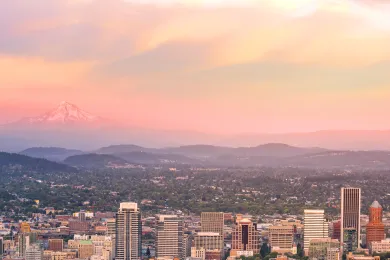 A photo of downtown Portland Oregon at sunset from Pittock Mansion