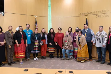 Native employees and community members pose with County leaders in celebration of Native American Heritage Month