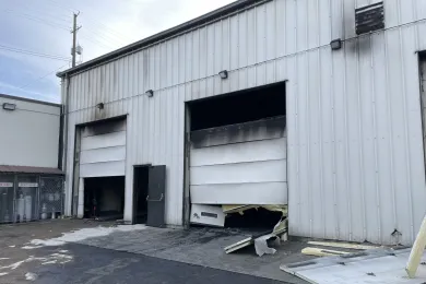 The maintenance area of the building where many Department of Community Services transportation vehicles are parked sustained substantial damage. 
