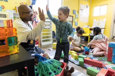 Staff and children at the Sunshine Center, a Preschool for All provider.