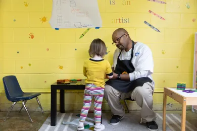 Teacher helpings tudent