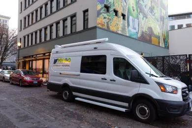 Behavioral Health Resource Center, and the van used to distribute entry tickets, in late 2023.