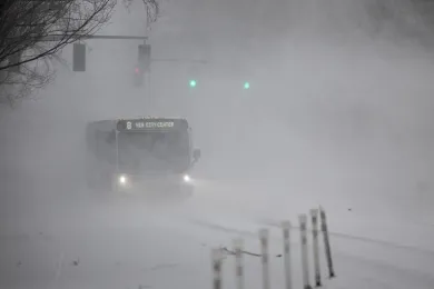 TriMet bus traveling in snow.