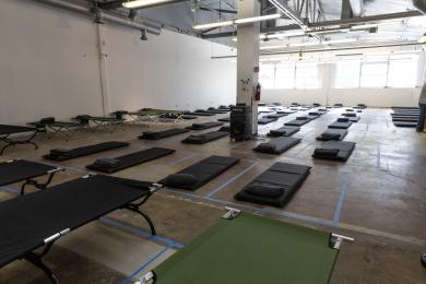 Sleeping pads on the floor of a shelter