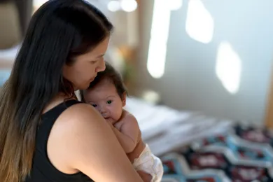Mom holding a baby