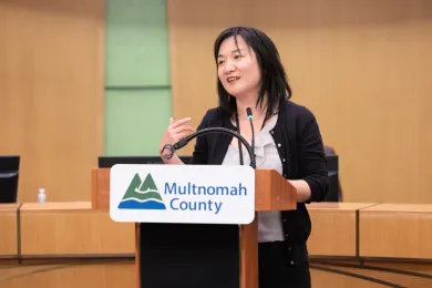 Woman at podium