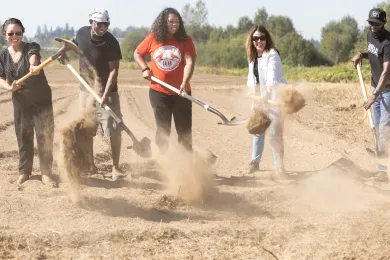 County leaders and farmers break ground in 2022 at new CROPS site.