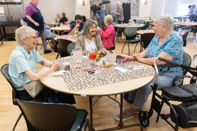 A group of friends gather at the Gresham Senior Center for congregate meals. 