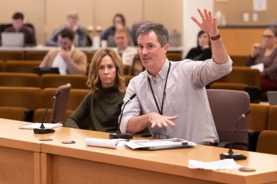 Budget Director Christian Elkin, left, and County Economist Jeff Renfro present the 2026-27 forecast to the Board of Commissioners on Nov. 13, 2025.