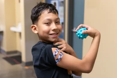 A child receives a vaccine