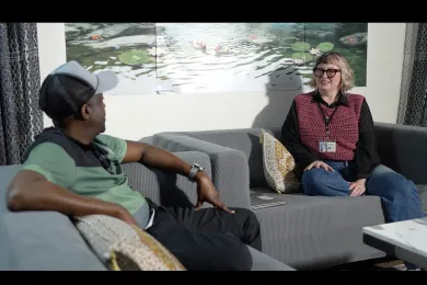 Intellectual and Developmental Disabilities Service Coordinator Erica Borman sits with client. 