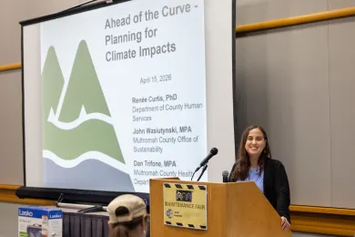 County employee poses for photo at ahead of the curve; planning for heat, climate impacts