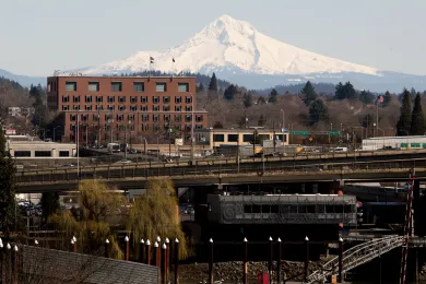 Multnomah Building with Mount Hood in the background. 