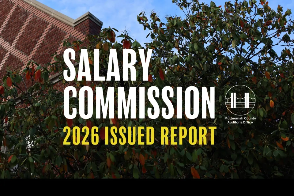Brown building and trees with text that says, "Salary Commission 2026 Issued Report"