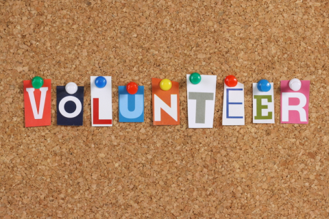 photo of bulletin board with word volunteer